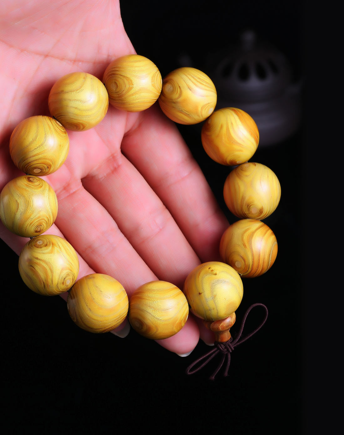 小叶黄金木鬼脸对眼手串20mm